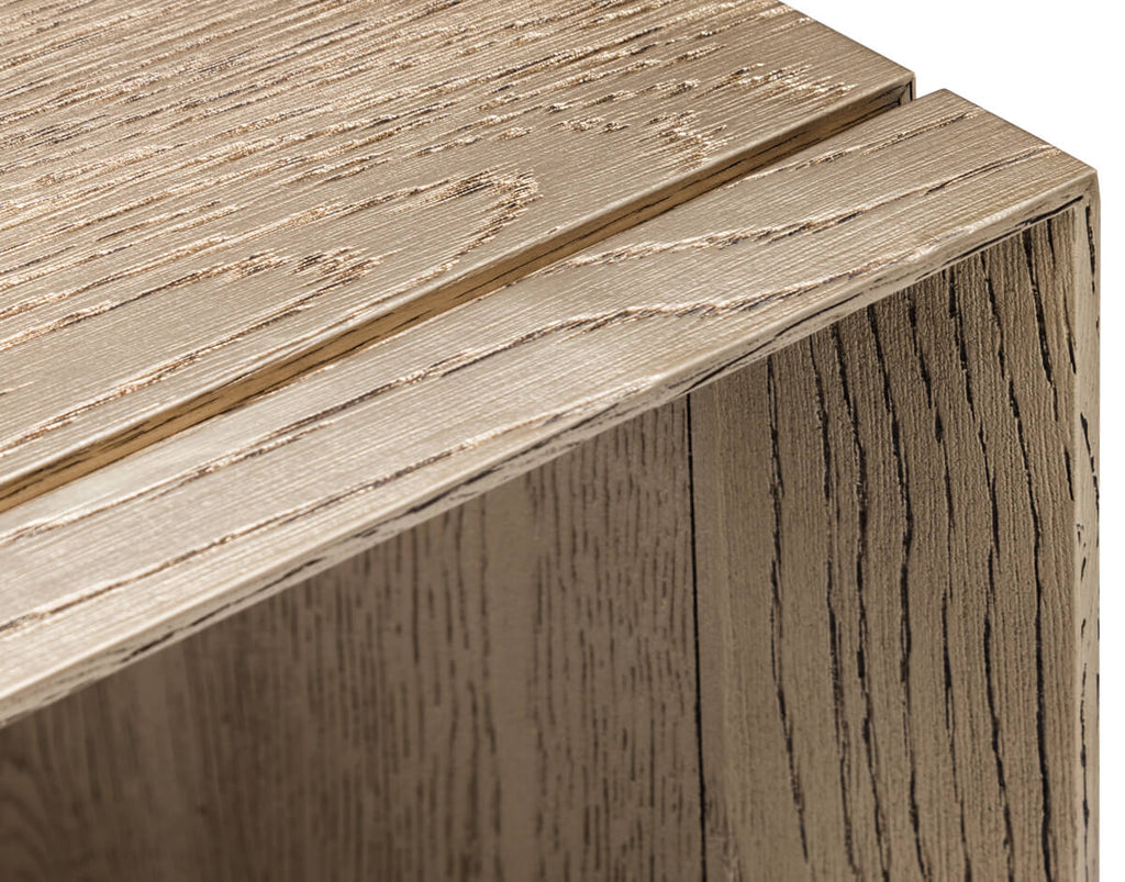 Light-colored wooden Vienna Bench with prominent grain and subtle metallic sheen