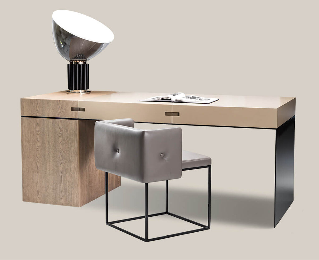 Brussels Desk featuring light wood and black metal with grey upholstered chair and modern lamp
