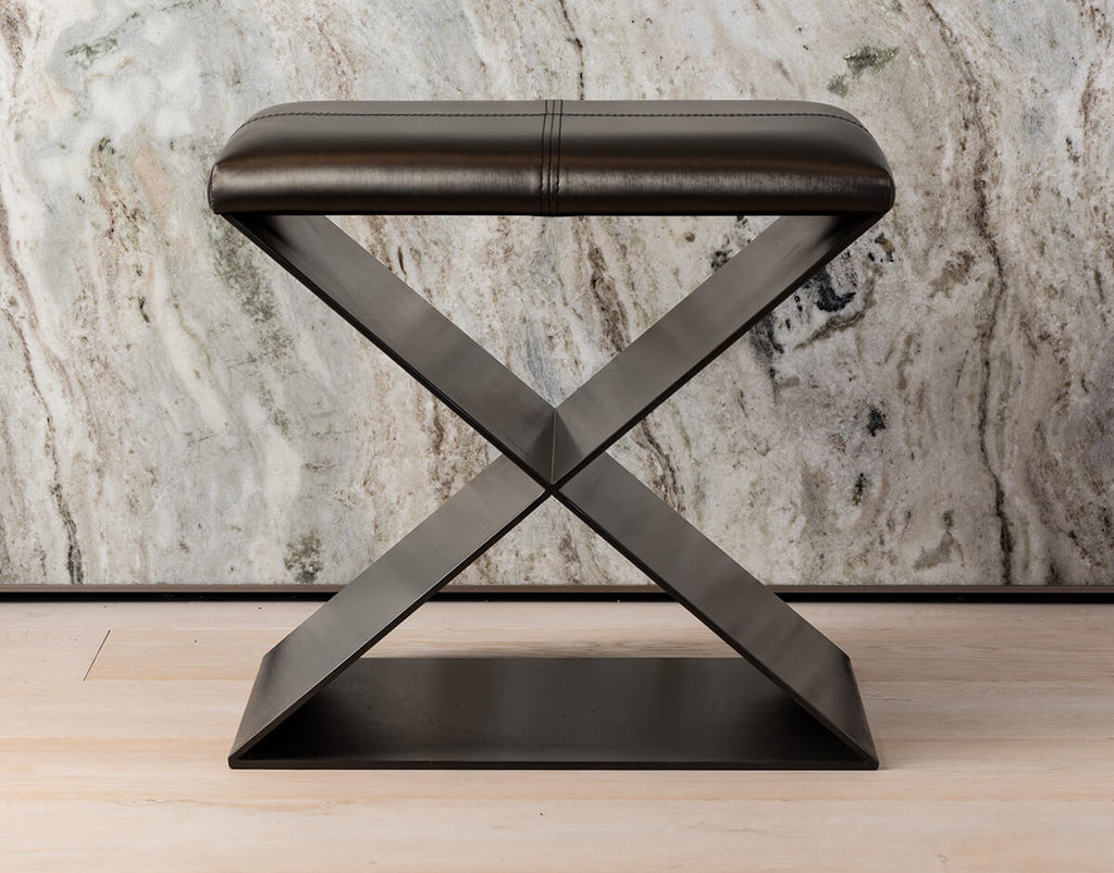 Dark brown leather Santorini Stool with X-shaped metal base for modern seating