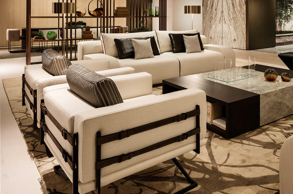 Modern living room with Rome Chair white upholstered sofa and matching armchairs