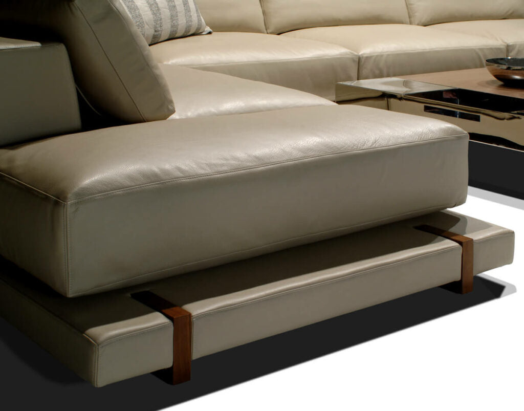 Modern L-shaped Bulgari Sofa in light beige leather with wide cushions and unique base