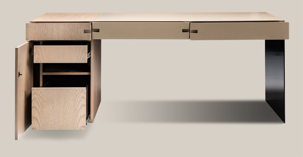Brussels Desk with light wood finish, cabinet, drawers, and dark L-shaped leg