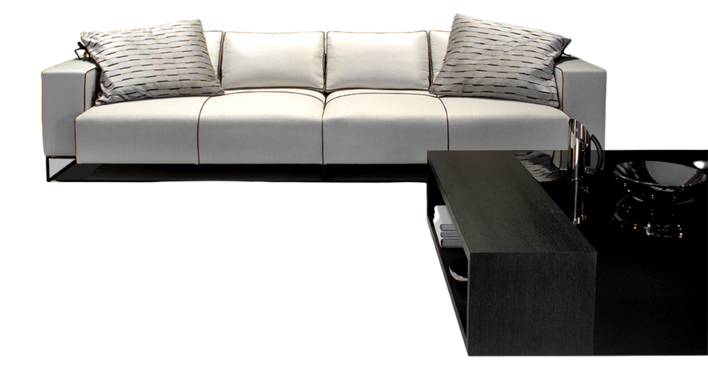 Modern light-colored Glasgow Sofa with four cushions and two patterned throw pillows