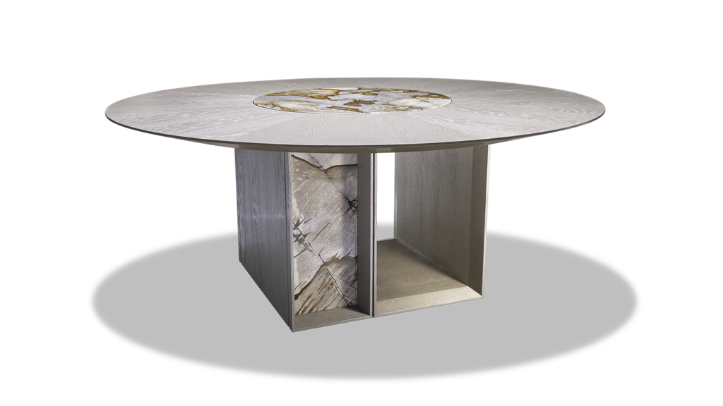 Vienna Round Table with light-colored top and multifaceted base with natural stone accents