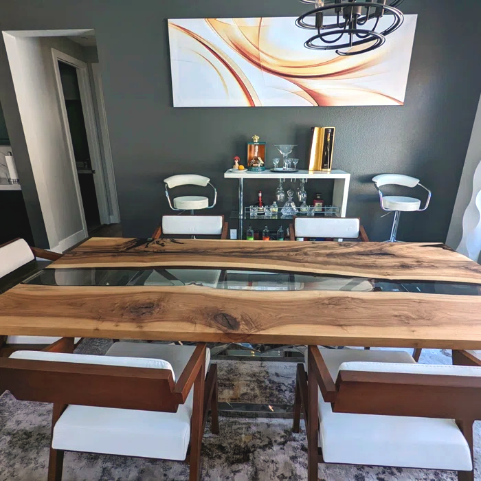 Abruzzo Walnut Dining Table featuring live-edge wood and glass design