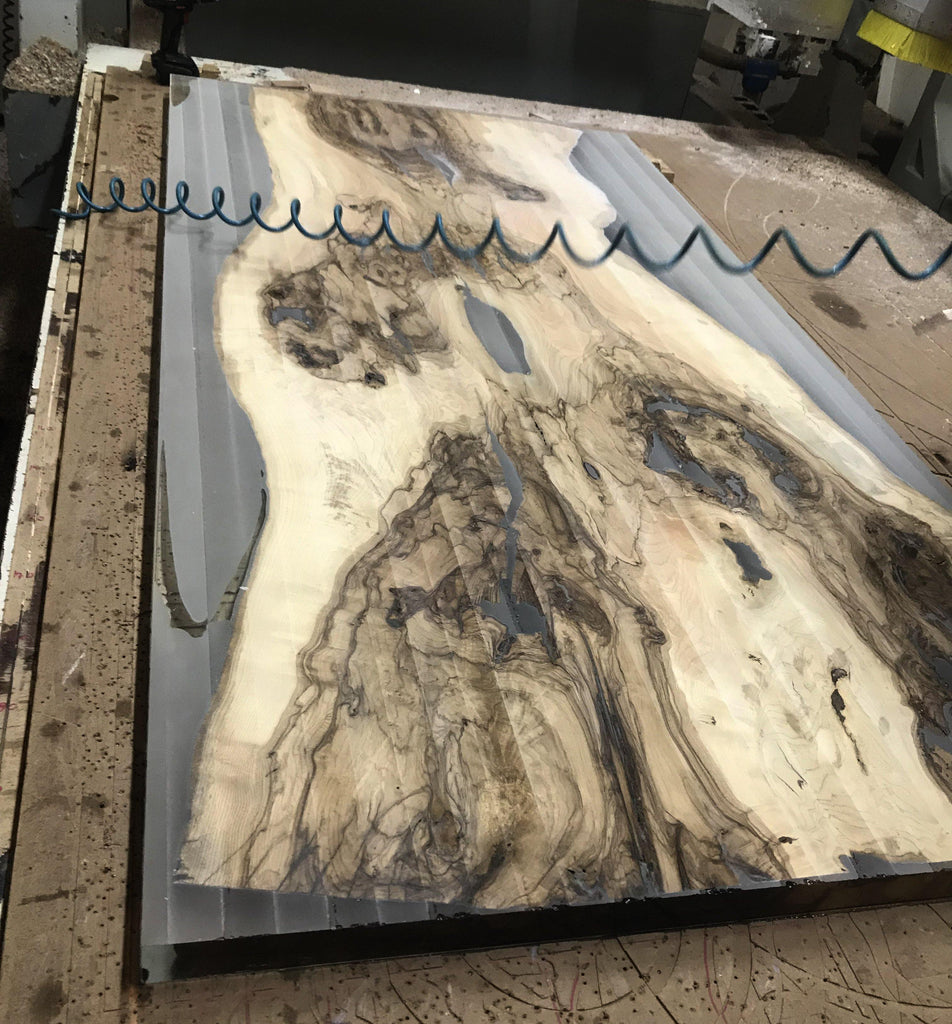 Amathus Ash Wood Dining Table with river-style resin and live-edge dark grain