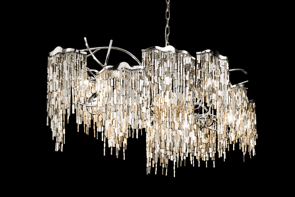 Arthur Chandelier Oval featuring a chrome frame with hanging glass crystals and internal illumination