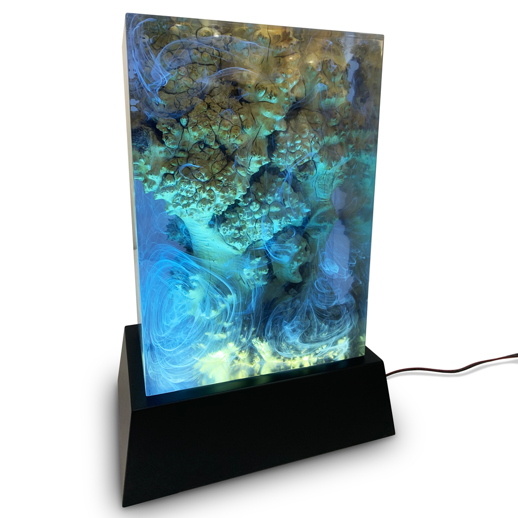 Aura Ocean Cube Lamp with illuminated ocean scene, blue swirls, coral-like structures