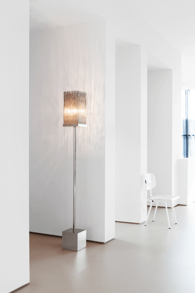 Modern Broom Floor Lamp with rectangular metallic base and textured lampshade