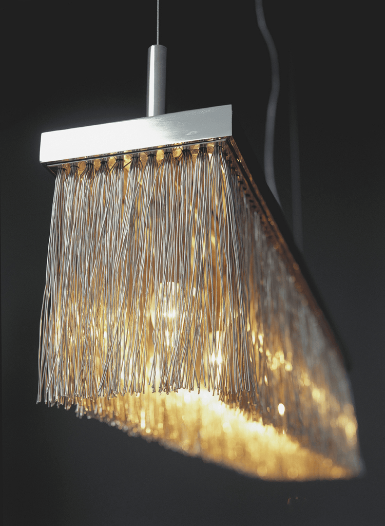 Modern Broom Hanging Lamp with metallic silver frame and warm golden dangling strands