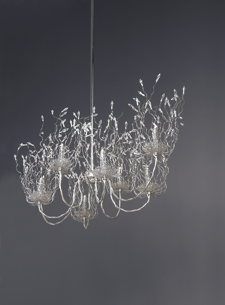 Silver spirits chandelier oval with delicate branch-like extensions and crystalline accents