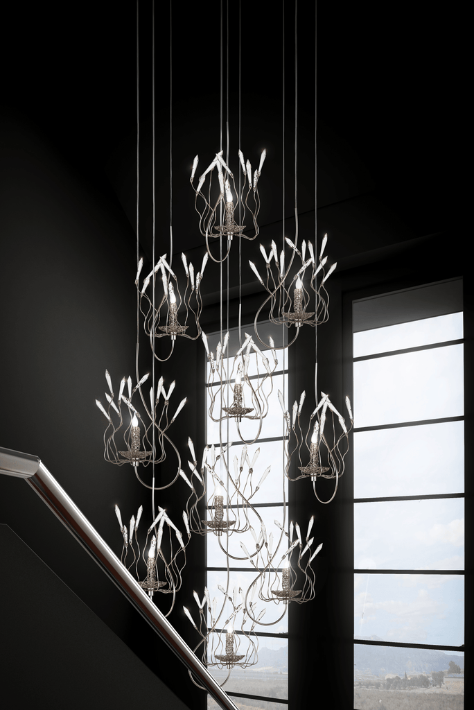 Modern multi-tiered spirits hanging lamp with crystal accents and flowing metalwork