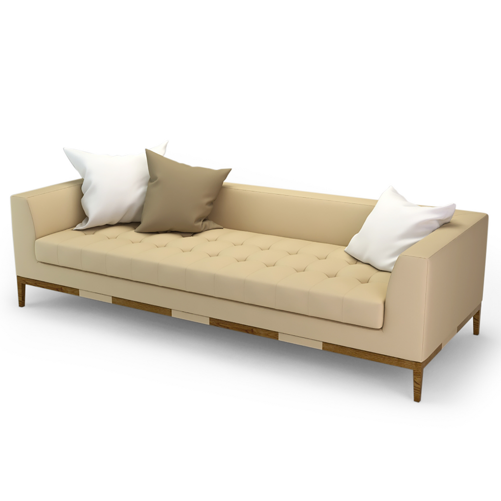 Costa Sofa featuring a long light beige tufted design with wooden legs and throw pillows