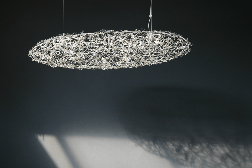 Crystal Waters Hanging pendant light with intricate woven wire design and illuminated bulbs