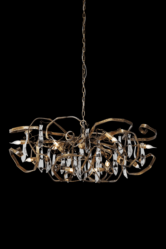 Delphinium Chandelier Oval with bronze-toned abstract metal frame and clear crystal pendalogues