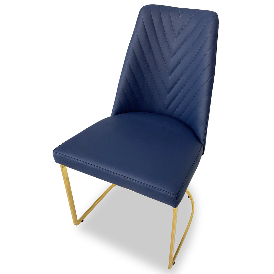 Enyo Dining Chair with dark blue chevron backrest and gold cantilever legs