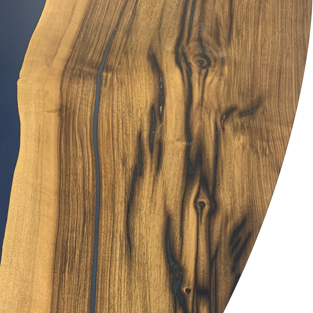 Evohe Blue River Walnut wooden table with natural edge and dark resin infill