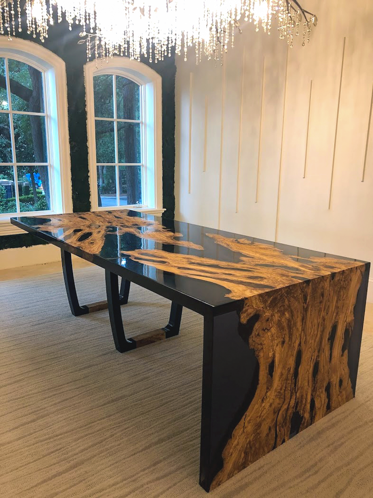 Black Staphyle semi-waterfall olive wood dining table with black resin and U-shaped base