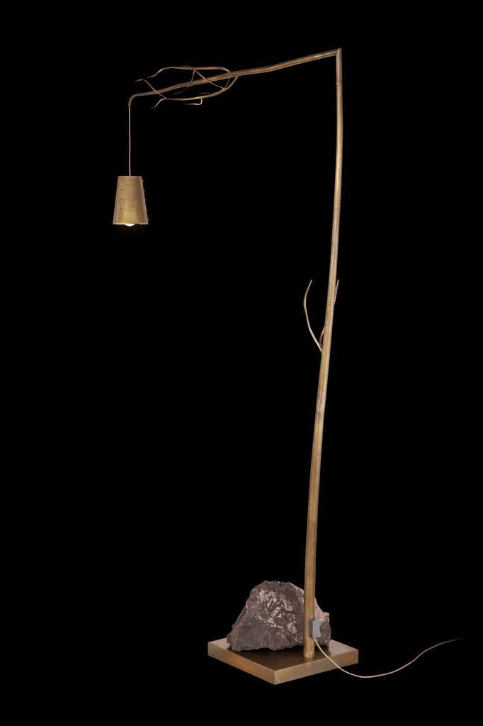 Rustic Flintstone Floor Lamp with branch-like stem, small shade, and stone base