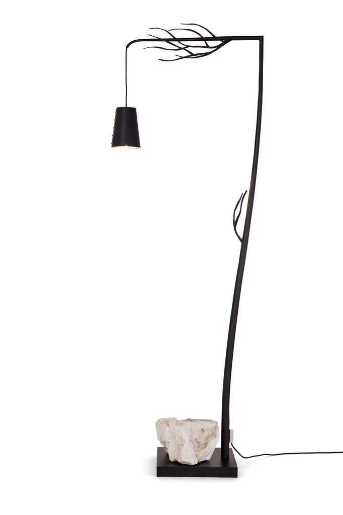Black Flintstone Floor Lamp with branch design, hanging shade, and light-colored rock base