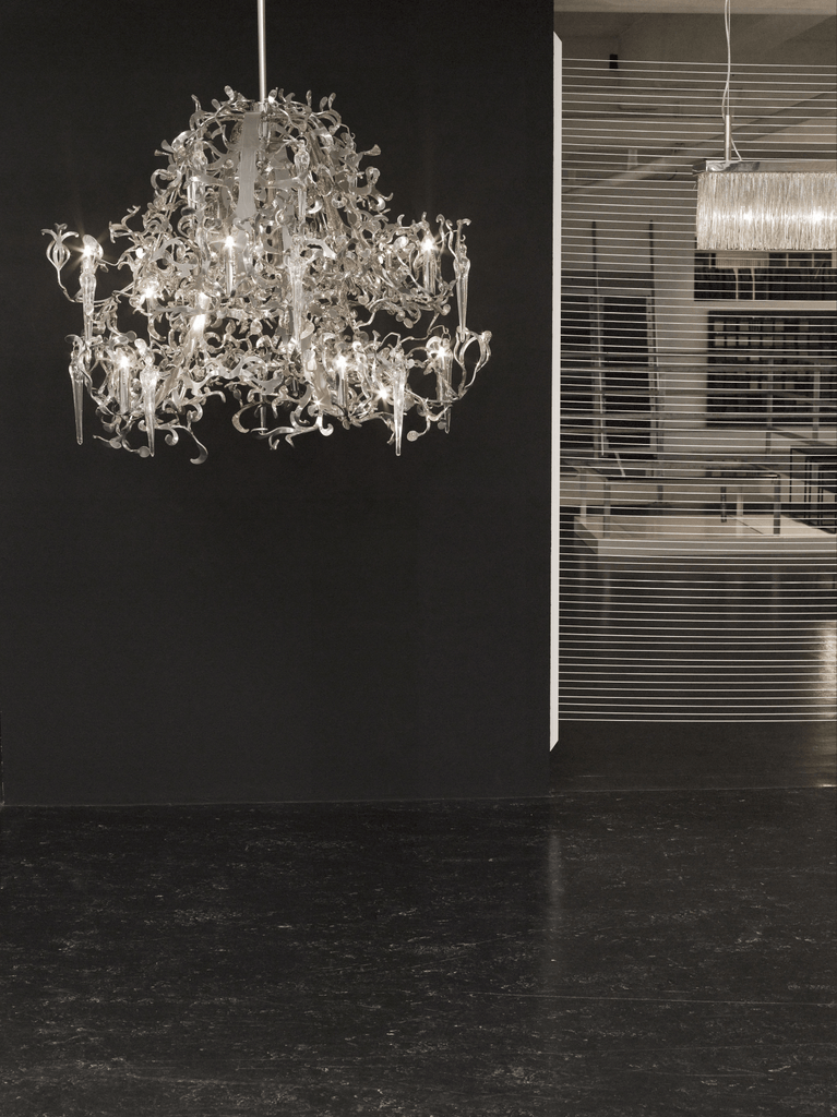 Ornate Flower Power Chandelier Round with multi-tiered crystal and lit bulbs