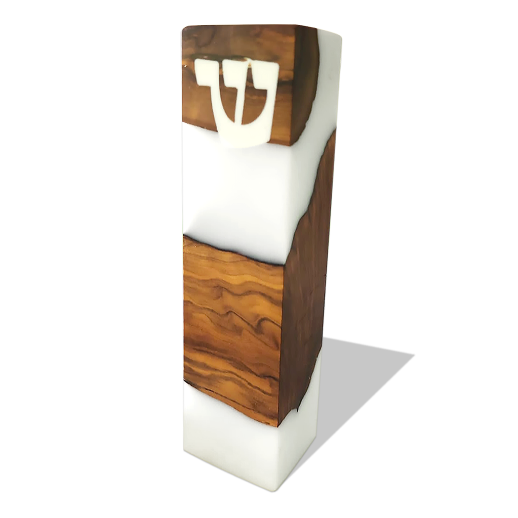 Modern mezuzah featuring a brown wooden design with white resin accents and Hebrew Shin