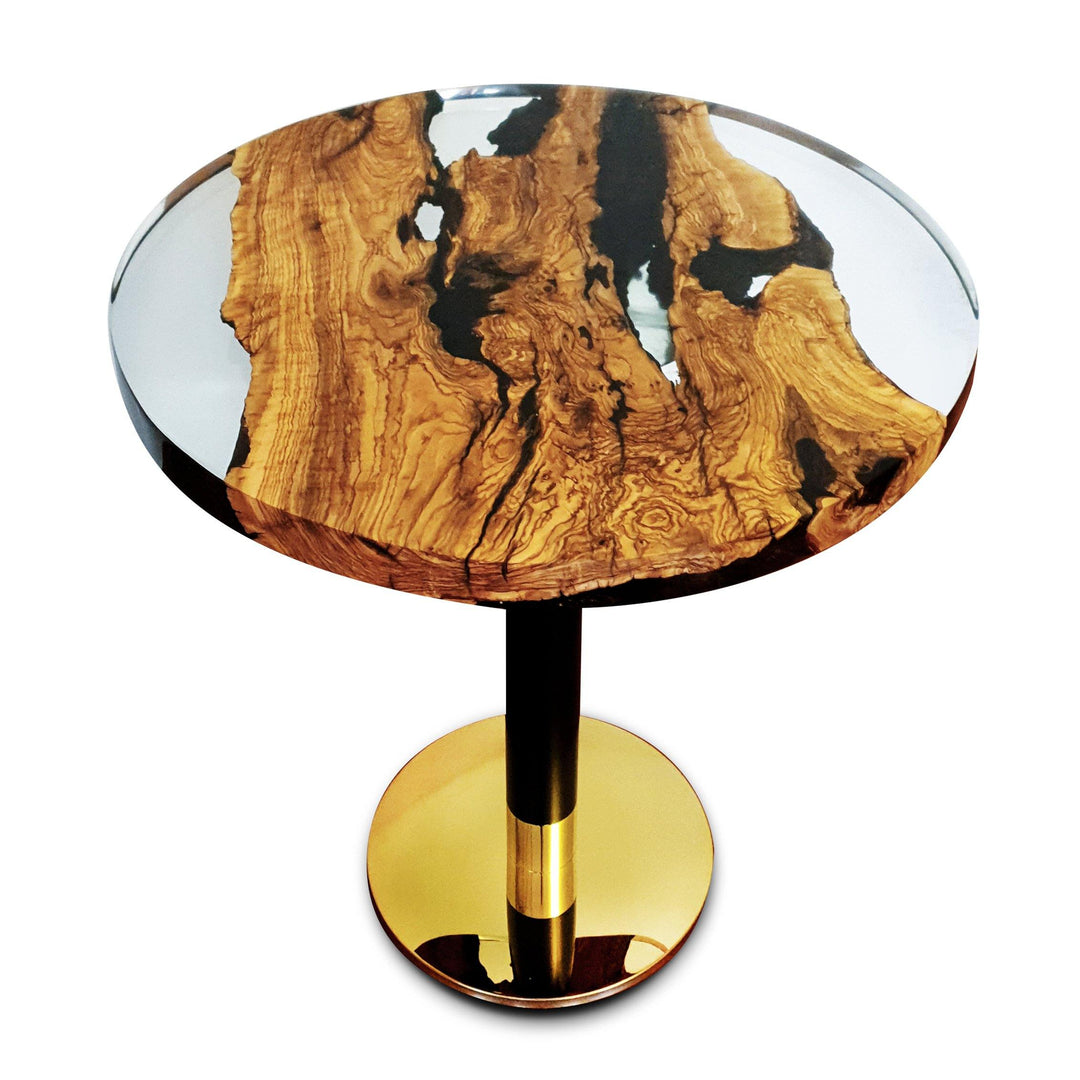 Olive Wood Round Dining Table with live edge wood and resin oval top on black gold pedestal