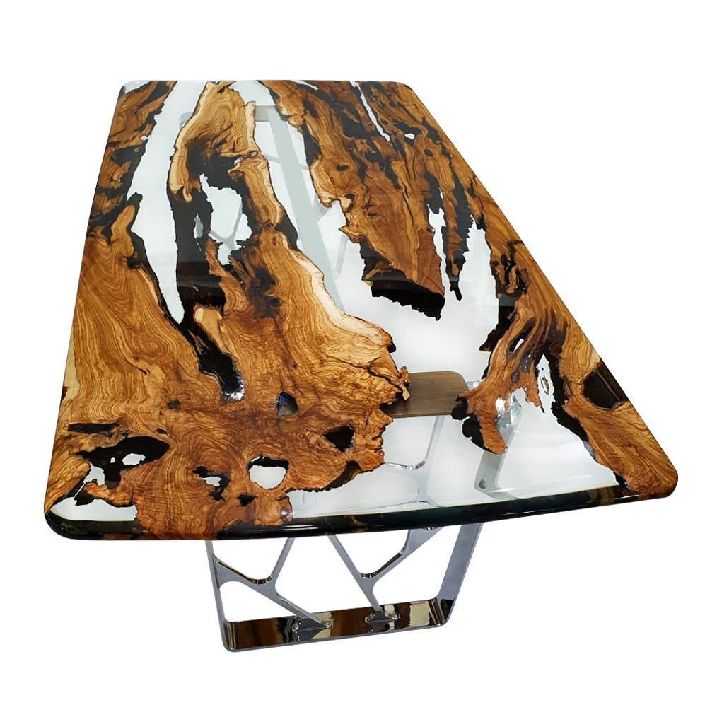 Ombrone Olive Dining Table with clear resin, live-edge wood top, and open-frame metal base