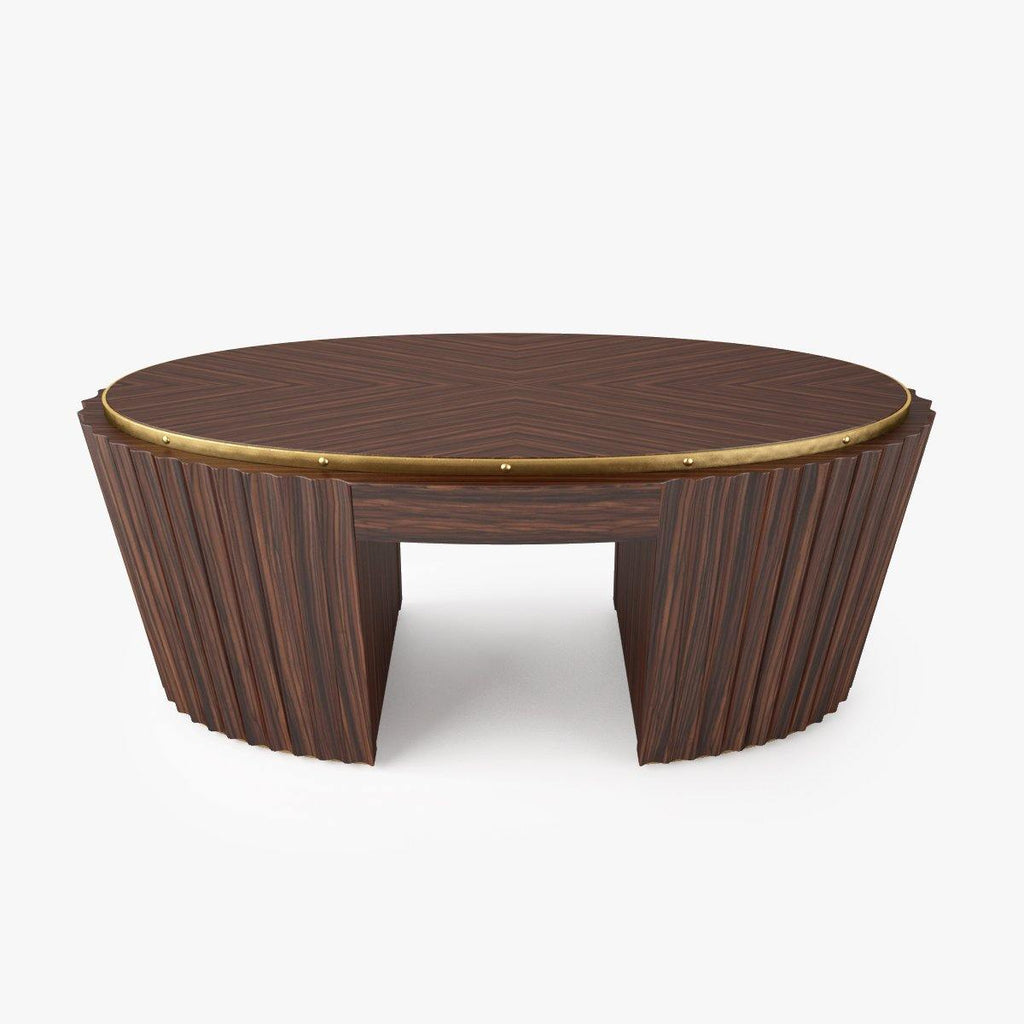 Oval cocktail table with dark wood finish, gold-toned rim, and ribbed base