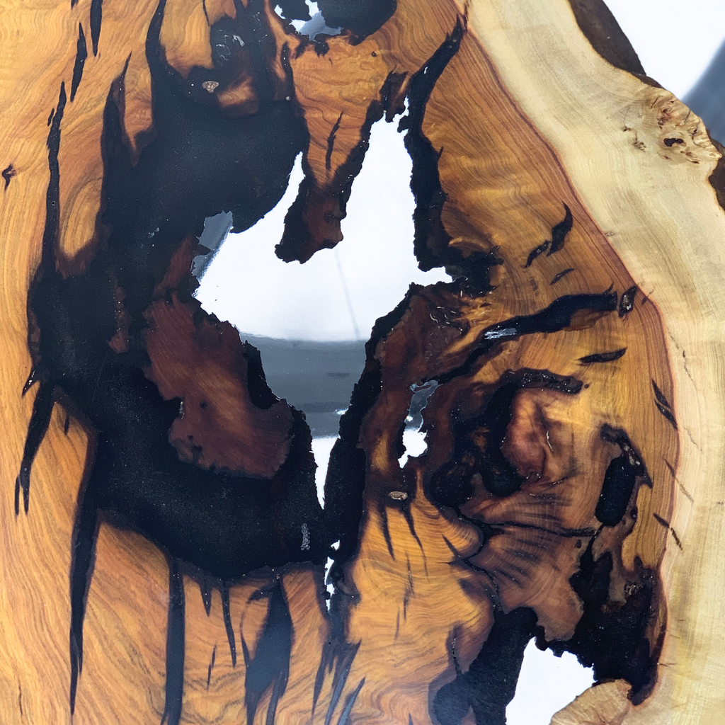 Pheraea Walnut Wood River Oval Dining Table with live-edge walnut wood and dark resin