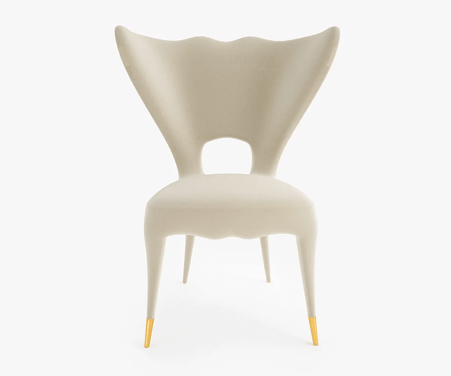 Victory Chair off-white dining chair with wavy backrest, cutout, and gold-tipped legs